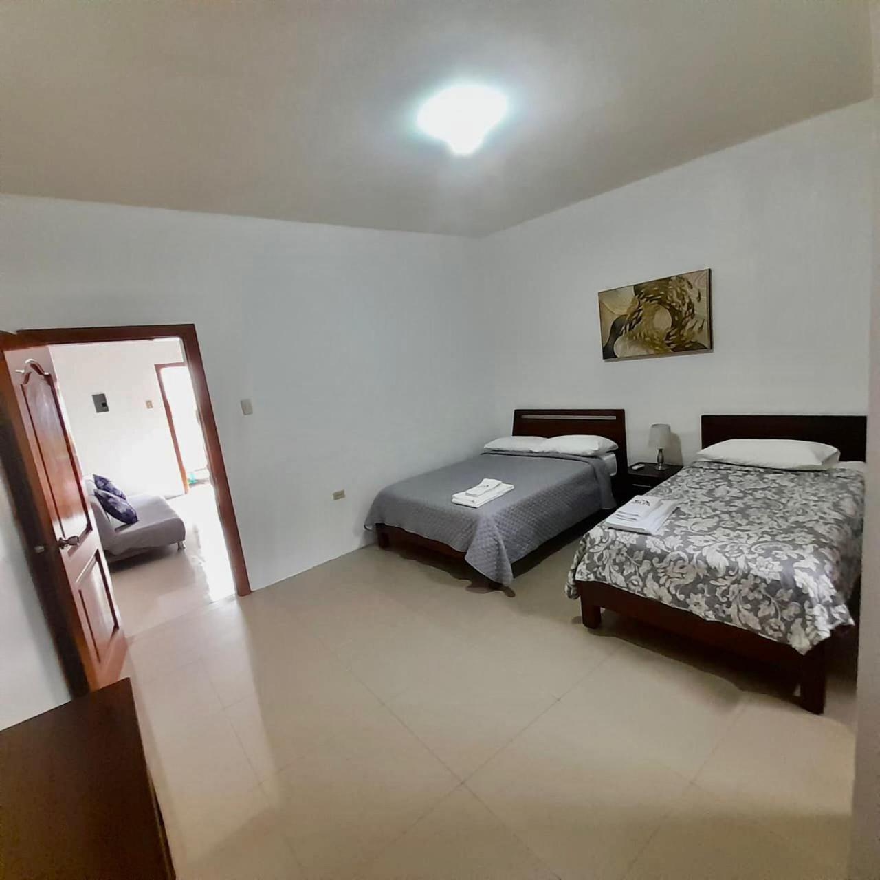 Apartahotel Casa Soleil Puerto Villamil Ruang foto